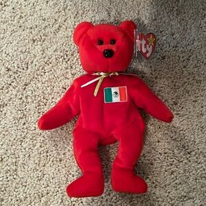 Vintage TY Beanie Baby OSITO
Stored in case